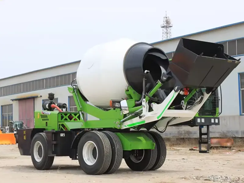 Self-loading concrete mixer truck